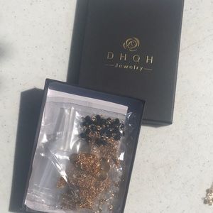 Brand new gold plated multi necklace set